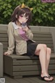 A girl sitting on a bench drinking a drink.